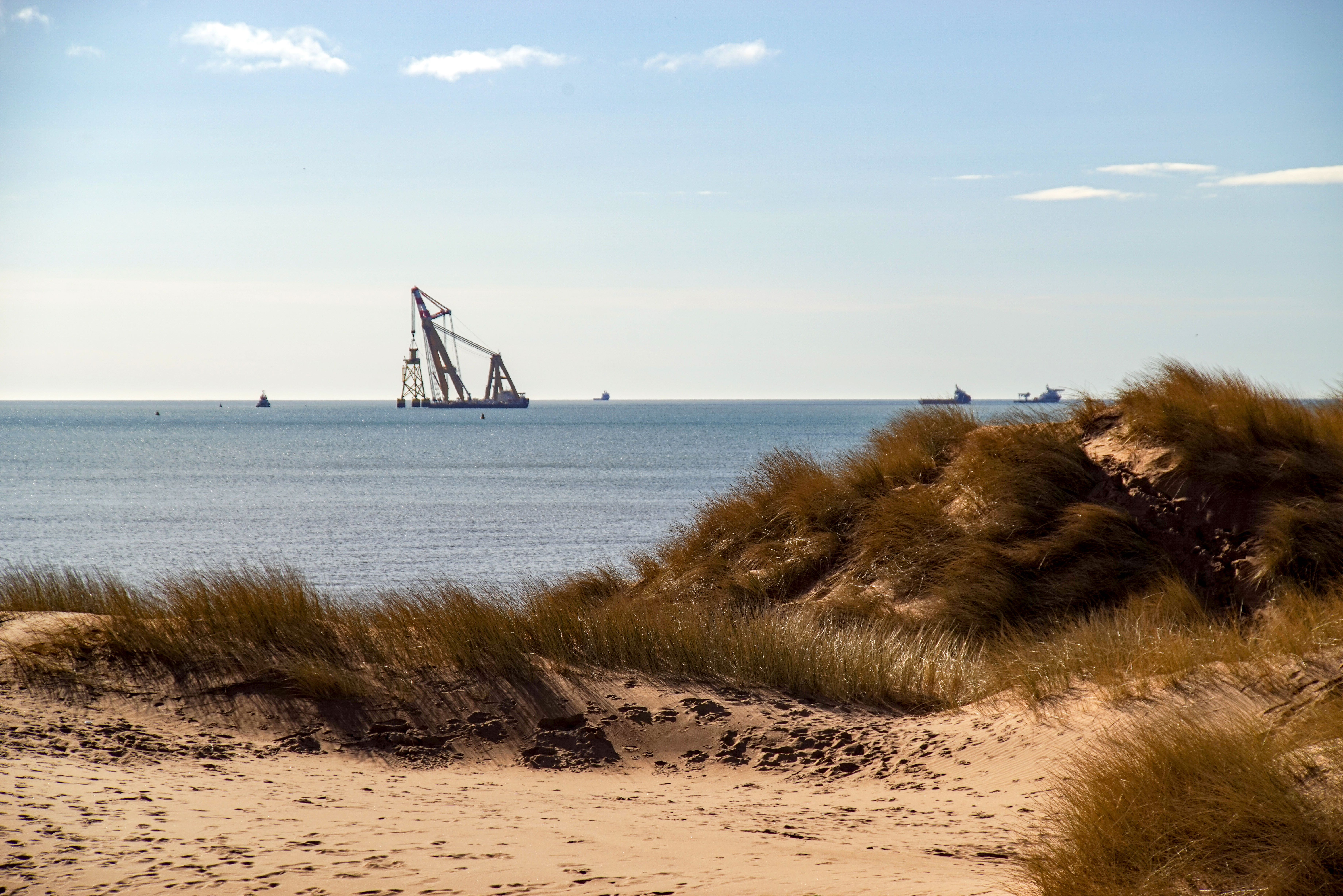 Scenic offshore wind farm representing our renewable energy services