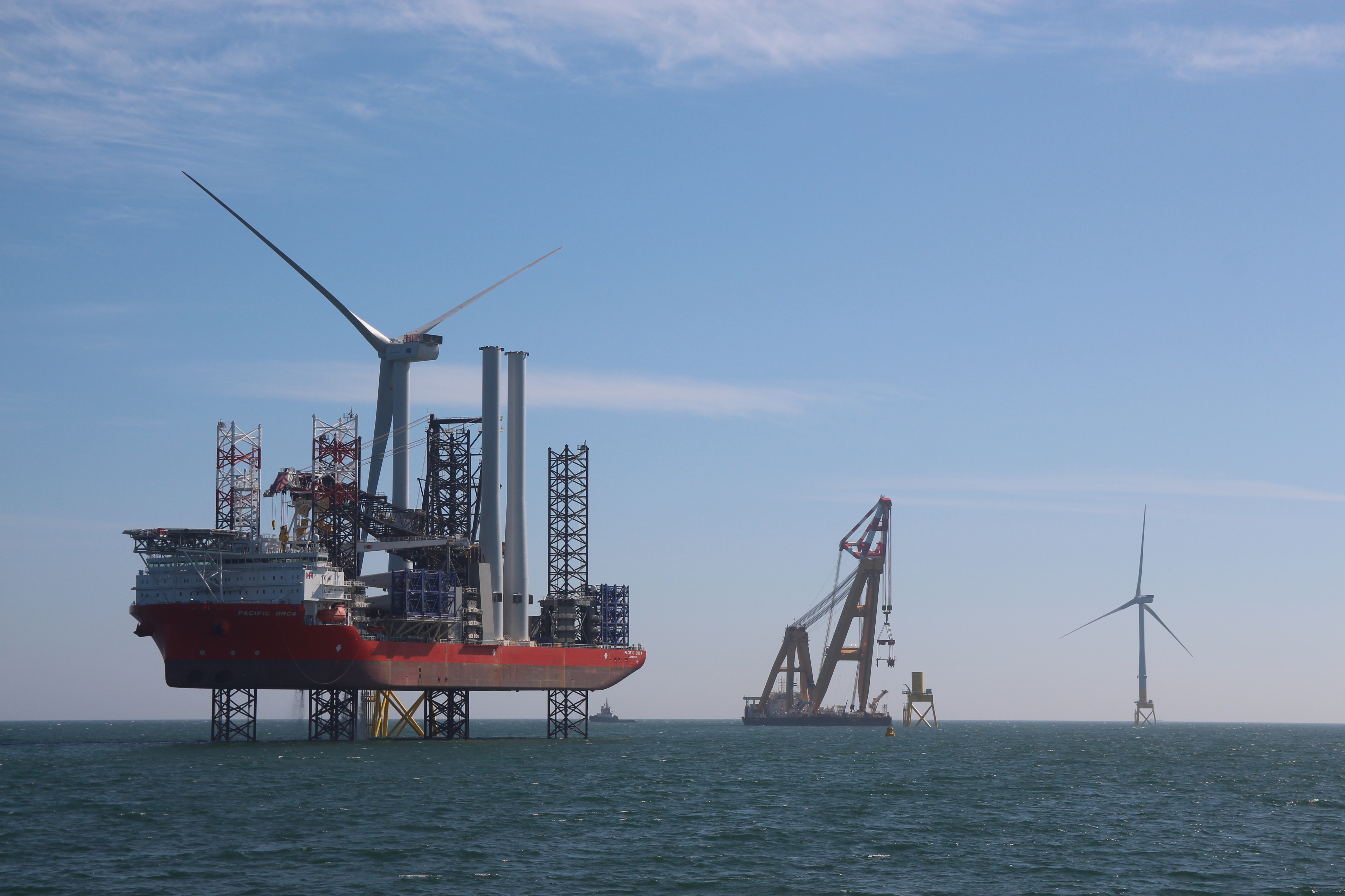 Background image of Aberdeen wind turbines on the sea